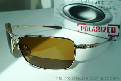 OO4044-02_Cross_polished+gold+%2B+bronze+polarized+copy.jpg