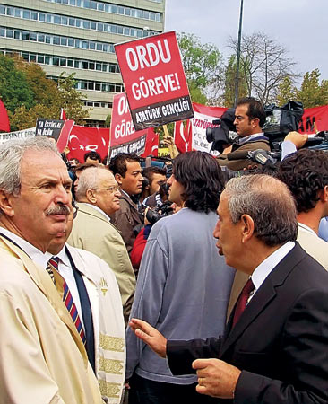 Kemal Guruz (at right) - Kemal Alemdaroglu (at left) - poster : "inviting junta to coup d'etat"