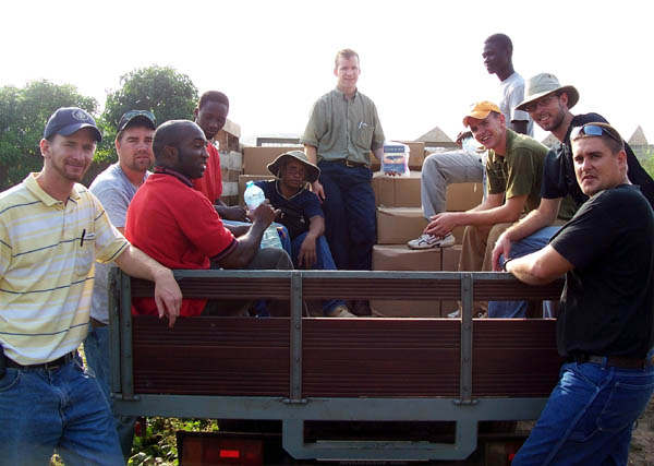[Africa_guys+on+truck_ready+to+head+to+bush.jpg]
