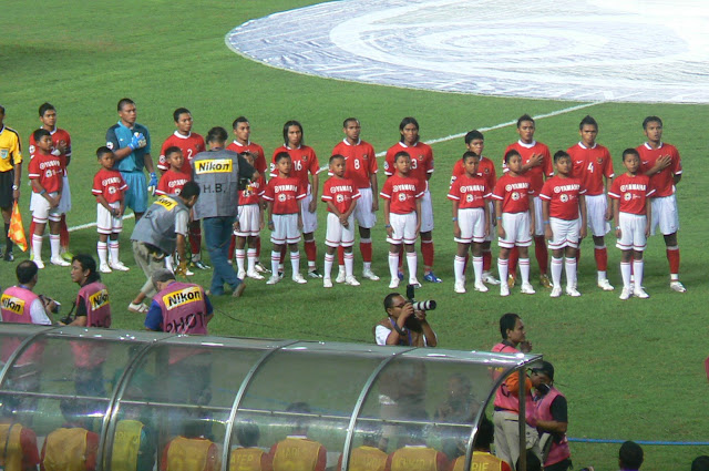 Indonesian players belt out their anthem