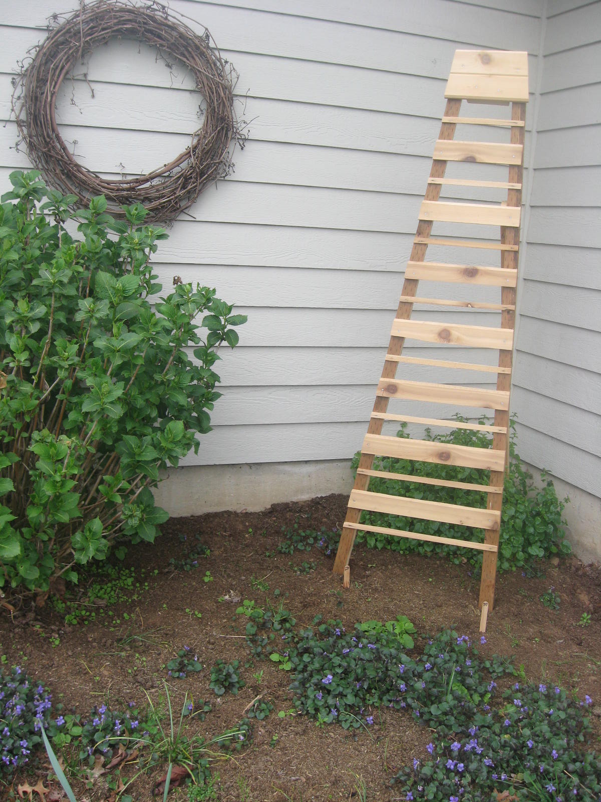 the garage working on a few woodworking projects with scraps of wood 