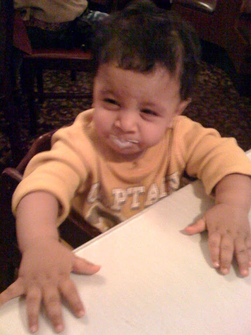 Ariv at an Indian restaurant eating raita