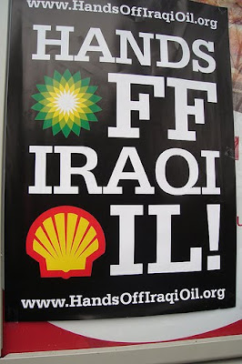 Protest poster that says hands off Iraqi oil