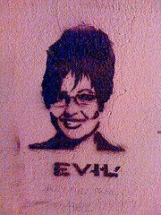 photo from alley with image of sarah palin with evil written below