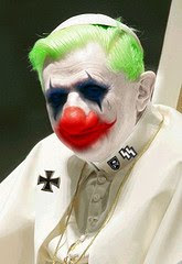 Ratzi wearing clown makeup, his Nazi medals, and a white dress