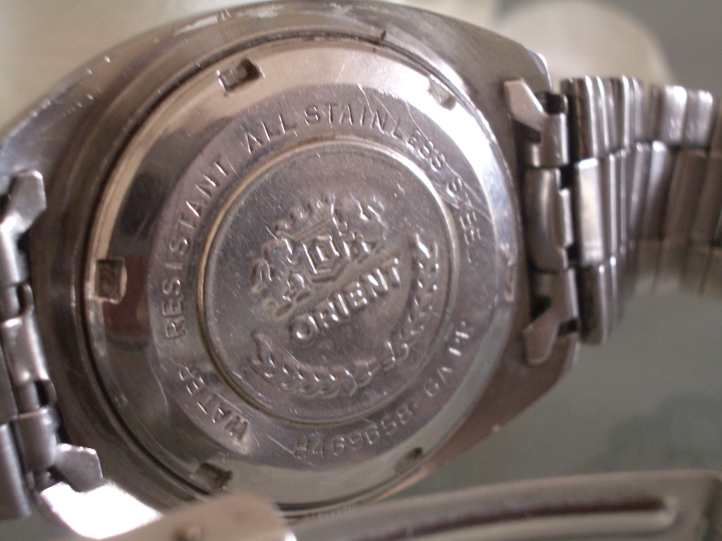 Номер на крышке часов. Часы Orient AAA. Ориент ААА Кристалл. Крышка часов Orient.