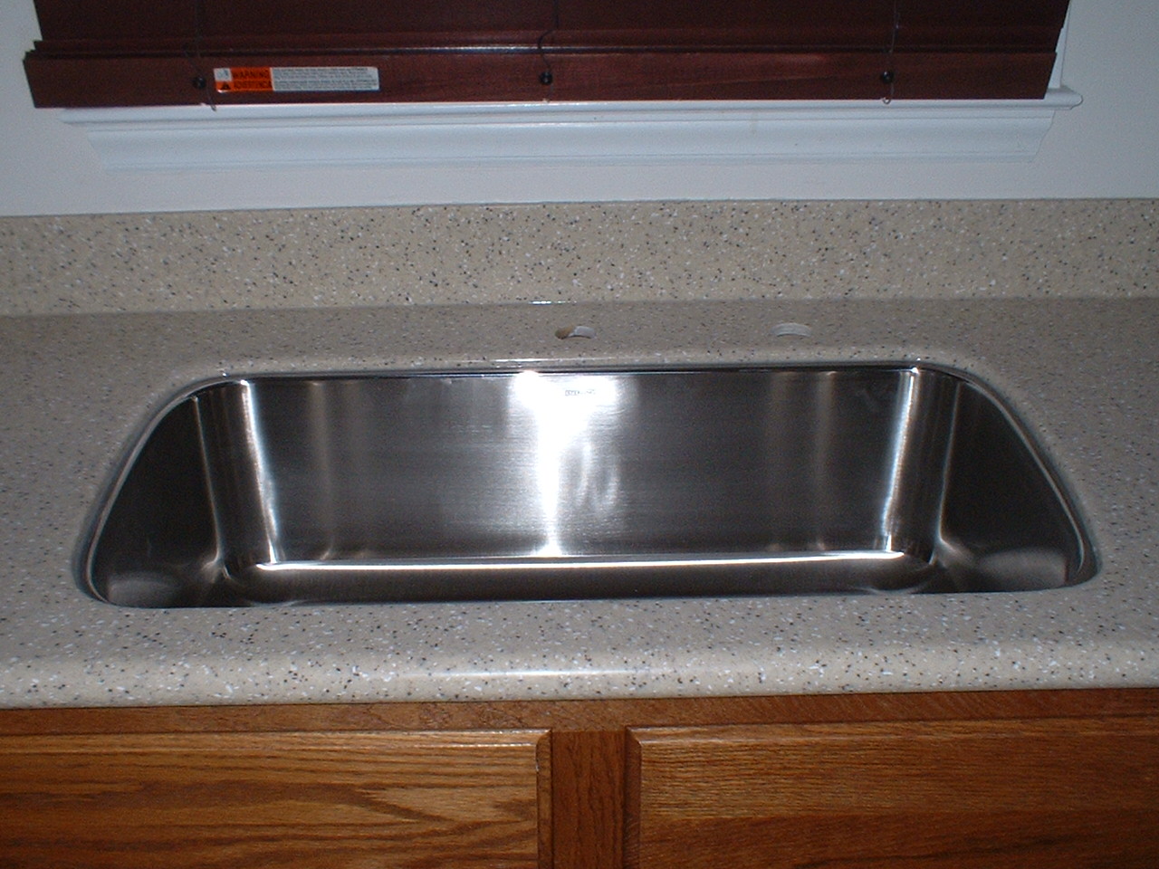 The Solid Surface Countertop Repair Blog Retrofit Hi Macs Sink