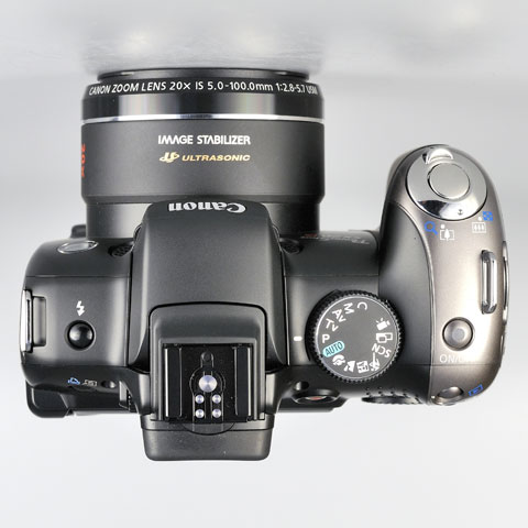[Canon-SX210-top-view.jpg]