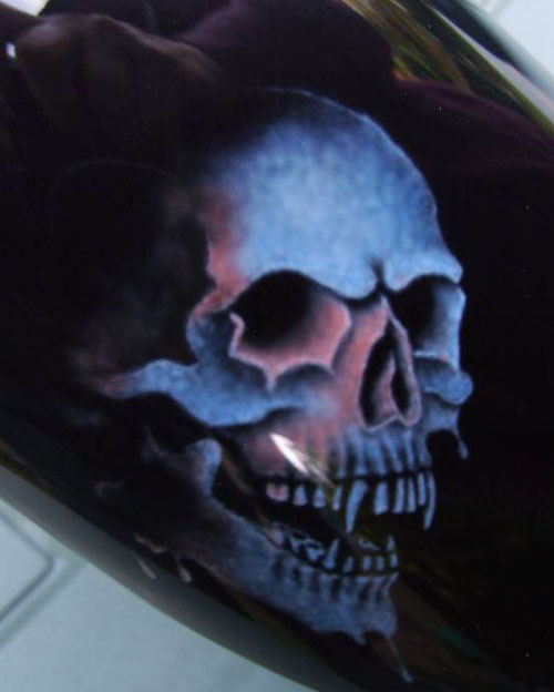 Airbrush Dragon Skull Art on Tank Close up of one of the ghostlike skulls