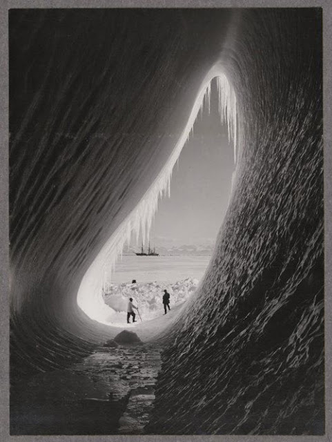 Grotto in an iceberg, photographed during the British Antarctic Expedition of 1911-1913, 5 Jan 1911. Photographer: Herbert Ponting. Silver gelatin print. Photographic Archive, Alexander Turnbull Library.