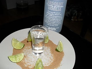 Plate with Lemon and Vodka bottle