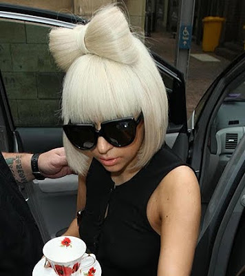 Lady Gaga hair bow and her bow nails! Its so cute!