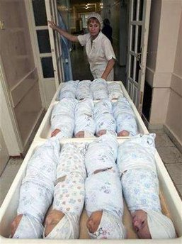 [+REUTERS:Sergei+Karpukhin+nurse+pulling+trolly.jpg]