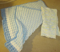 crocheted baby blanket and scarf