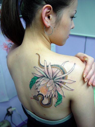 ... flower tattoo design created with airbrush in the asian girl back body