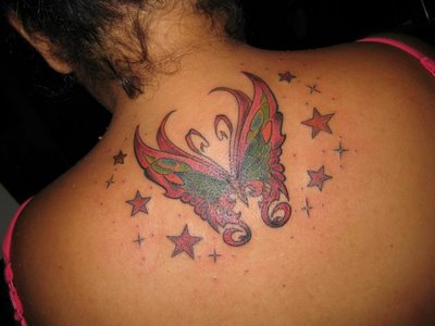 nice butterfly tattoo designs for women with dark skin color 