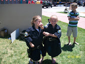 Haylee and Kylee dressed up as cops!