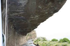 Driving Under the Rock Overhang Along the Beach Road