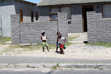 House Across the Street from Liziwe's with Curious Children Watching Us Get Off the Buses!