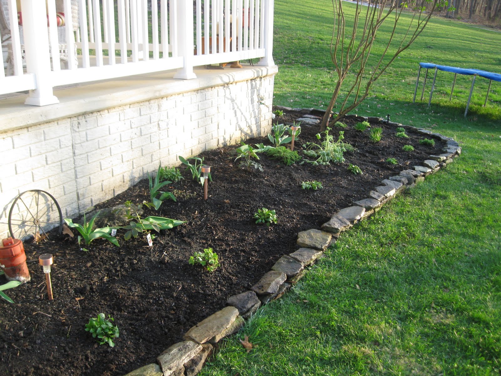 Gardening just for fun! Project expand flowerbed around front porch
