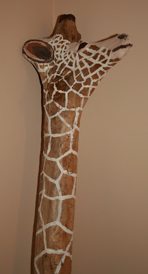 Painted giraffe driftwood sculpture