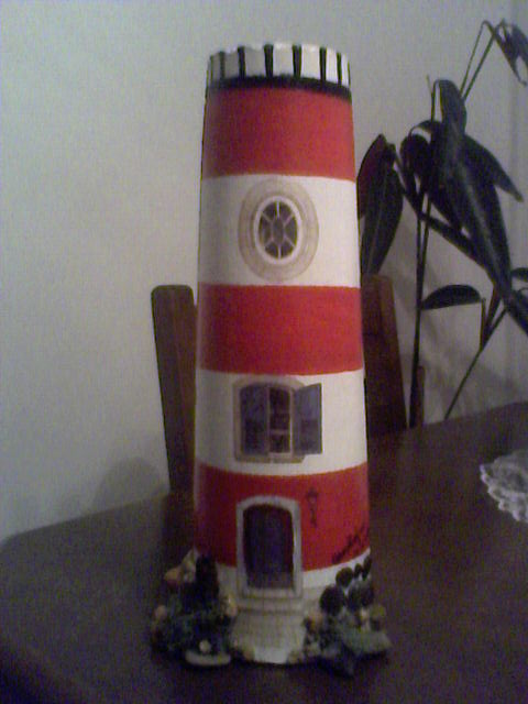 Farol em telha pequena com pedrinhas