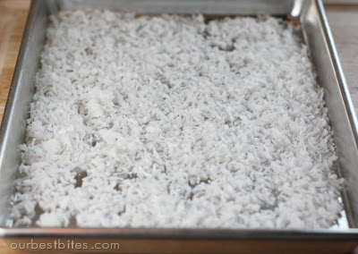 coconut flakes on baking sheet
