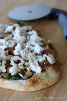 flatbread pizza with spinach, caramelized onions, and feta
