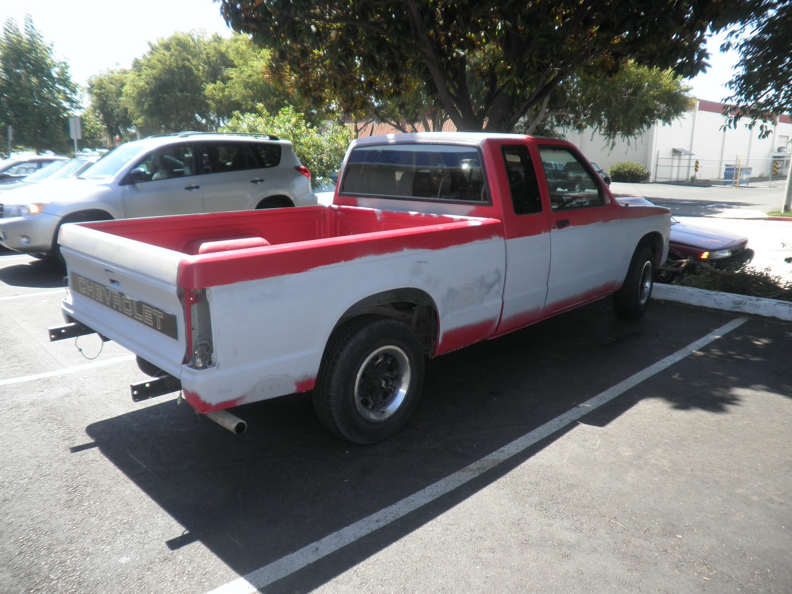 pick-up truck that came in for a 2-tone paint service with single stage pai...