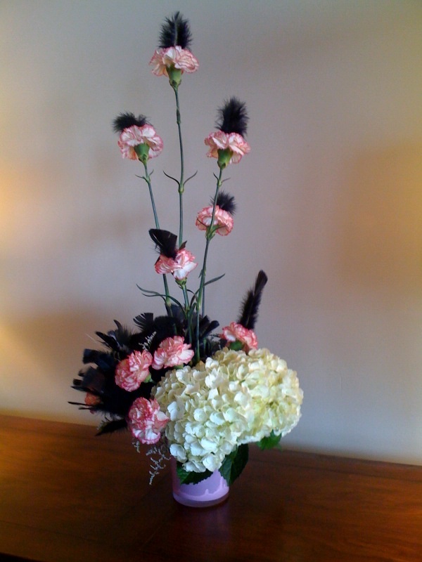 wedding centerpieces with crystals and feathers