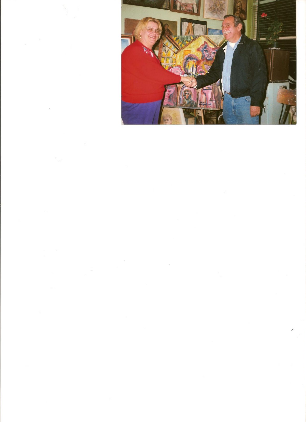 Al Waterman congratulating Dixie on her painting