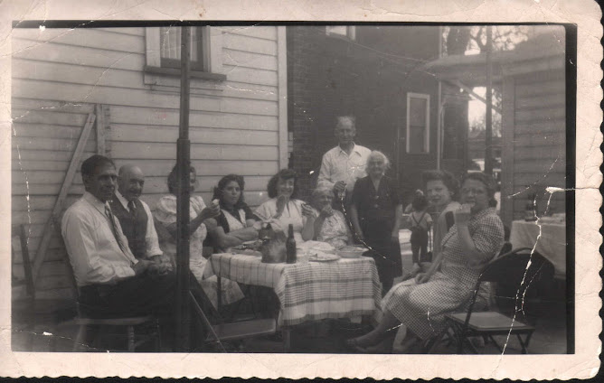Dinning outdoors ~1940