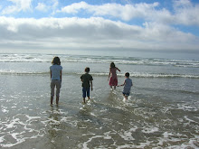 The kids first steps into the Pacific
