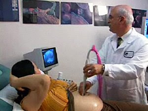 Image: Dr Michael Kamrava performs an ultrasound on Nadya Suleman in 2006