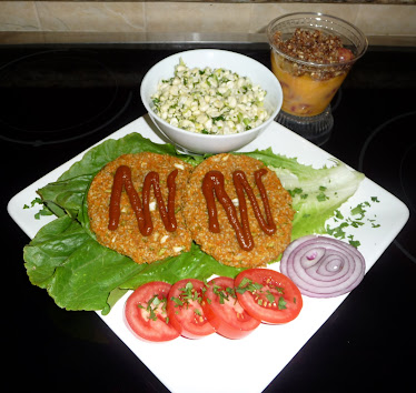 Raw Burgers with BBQ Sauce and Fixins