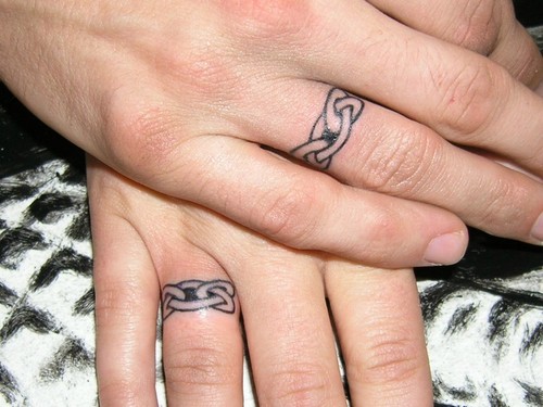 Wedding Ring Tattoos. A tattooed wedding ring can be a beautiful design 