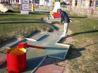 Emily Gottfried playing the Arnold Palmer Crazy Golf course at Starr Gate in Blackpool