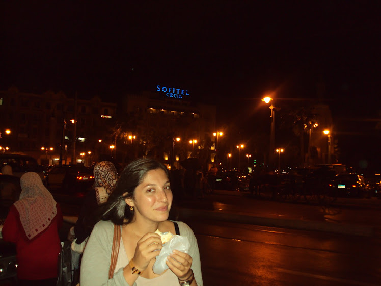 Me eating my fool sandwich in front of the Sofitel on the Corniche