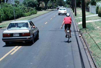 Image of motorist passing a bicyclist