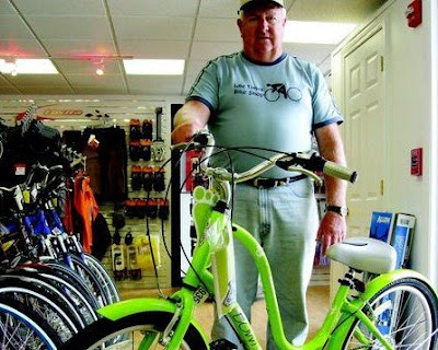 Idle Times inventory manager Donald Watson holds one of the new bike designs that emphasize comfort and style.