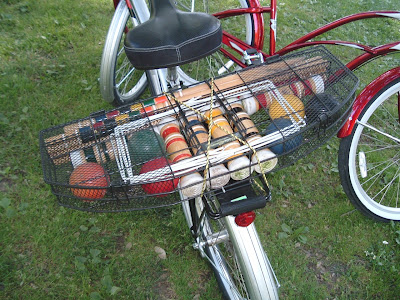 Image of bike with crocquet mallets in Sacramento's McKinley Park