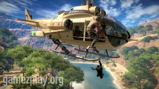 man hanging from helicopter with jungle and river scene behind