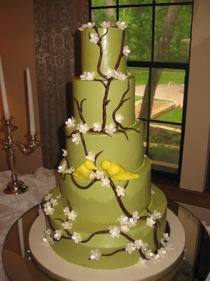 Great wedding cake with birds kissing on a branch