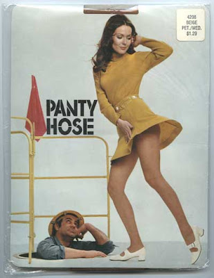 Panty hose package with woman in short dress flaring up while man in hardhat, down in a manhole, looks up her skirt