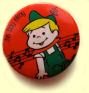 Red button with Elroy Jetson on it, label His Boy Elroy