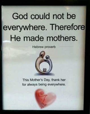 Advertising placard with a silver and gold looking abstract pin and the headline, God could not be everywhere. Therefore He made mothers