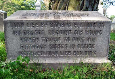 Gravestone saying a 15-year-old boy died by falling on an ink eraser while evading six young women trying to kiss him on his birthday