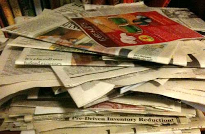 Large pile of newspapers