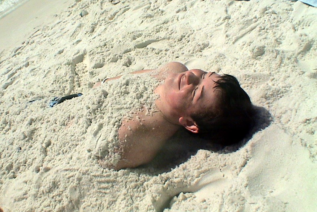 [mikey+buried+in+sand.jpg]