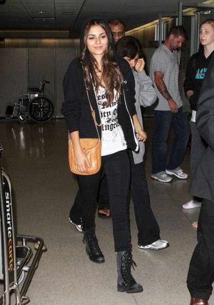 Some candids of Victoria Justice papped as she headed through LAX on August 